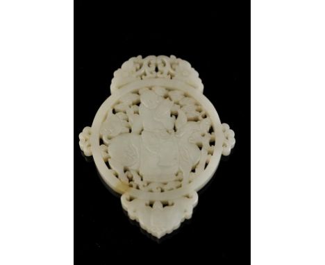 CARVED WHITE JADE PLAQUE, the pierced circular plaque carved with a boy riding a qilin, above are entwined scrolling lotus bl