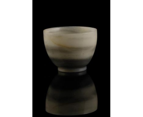 GREY AND WHITE JADE CUP, QING DYNASTY, the rounded sides raised on a slightly splayed circular foot, bears old collectors lab