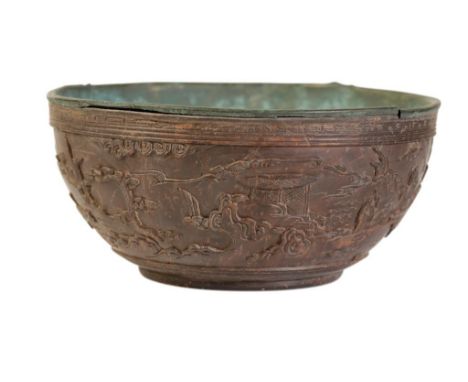 FINE CARVED COCONUT BOWL, KANGXI PERIOD, the sides finely carved with figures in a continuous mountain landscape, bears a Bro