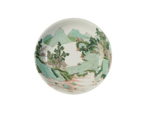 FAMILLE VERTE LOW DISH, EARLY KANGXI PERIOD, painted with pagoda and pine trees within a mountainous landscape view, the side