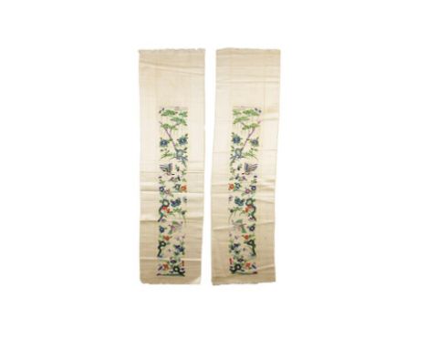 PAIR OF SILK MANDARIN'S SLEEVES, late Qing/early Republic, each worked with colourful butterflies fluttering amidst blossomin