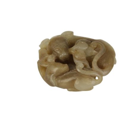 CELADON AND MOTTLED JADE 'TWO DOGS' GROUP, QING DYNASTY, carved with the animals entwined, one with a peach stem in its mouth