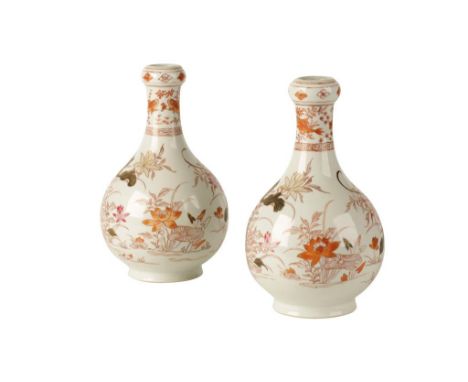PAIR OF BALUSTER BOTTLE VASES, KANGXI PERIOD, the ovoid sides painted in iron red, pink and gold with blossoming stems, the n
