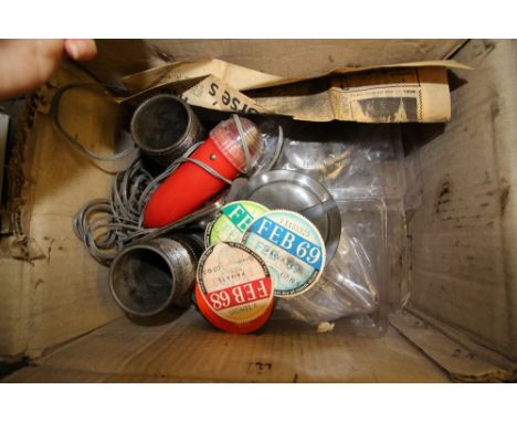 Box of MG parts and tax discs