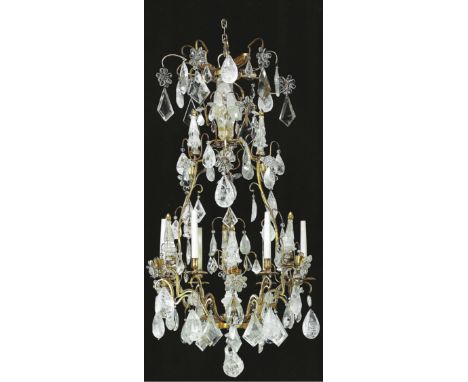 Property of a ladyFrenchLouis XV styleMaison Jansen Ormolu and rock crystal six-light chandelierThe open cage centred by an u