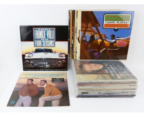 80+ Rock & pop LPs, ranging from the 60s  90s including Michael Jackson, Del Shannon, Jesus And Mary Chain, Neil Diamond etc.