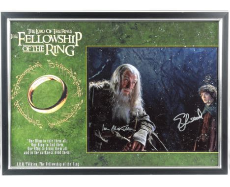 Lord of the Rings - photograph hand signed by Ian McKellen and Elijah Wood, in framed display, 18 x 13 inches overall.
