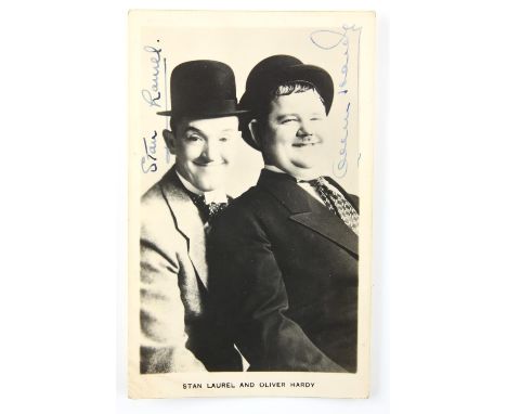 Stan Laurel & Oliver Hardy - English & American Film Comedians, vintage black & white publicity postcard, signed by both Laur