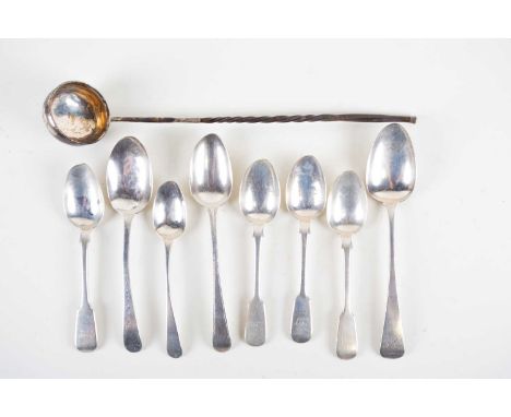 A group of silver flatware, 19th century and later, various dates and makers, together with a white metal toddy ladle, 34 cm,