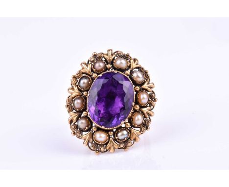 A yellow metal, amethyst, and pearl cocktail ring, set with a mixed oval-cut amethyst, in closed-back setting, surrounded wit