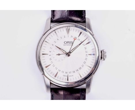 An Oris stainless steel automatic calendar wrist watch the silvered dial with arrow hour markers, luminescent hands with subs
