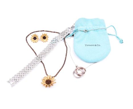 Tiffany &amp; Co. A 2012 Rubedo silver pendant, formed of three silver hoops (one rose gilt) on Tiffany chain, in original gi