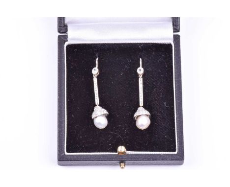 A pair of diamond and pearl drop earrings, each with a collet-set old-cut diamond, above a vertical diamond-set bar, with a d