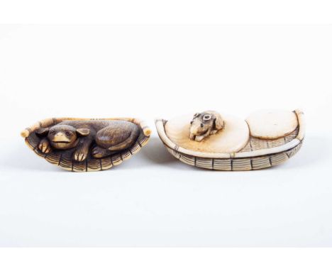 Two Japanese ivory netsuke, Meiji, one dark stained in the form of a dog resting in its woven bed, the other depicting a rat 