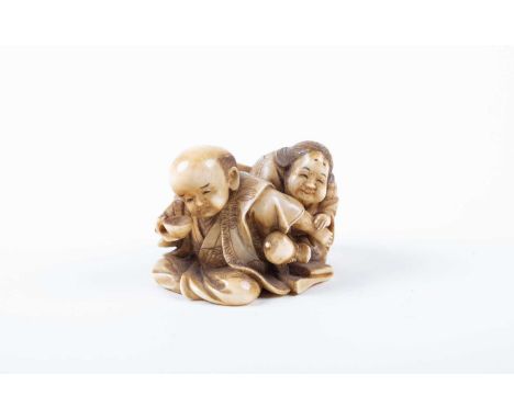 A humorous Japanese netsuke, Meiji, carved as Hyottoko and Okame, Hyottoko grimacing whilst holding a wine cup and Okame reac