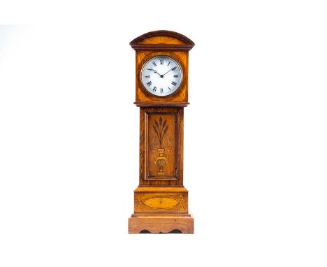 A late 19th century miniature rosewood and inlaid satinwood longcase clock, the enamel dial bearing Roman numerals, movement 