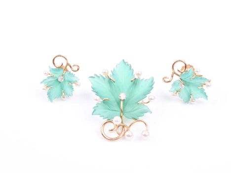 A yellow metal, diamonds, pearl, and green hardstone brooch, in the form of a carved maple leaf, inset with a small round-cut