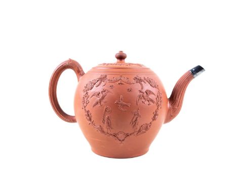 A large red stoneware teapot attributed to Elers, 18th century, the thinly and well potted body with applied chinoiserie spri