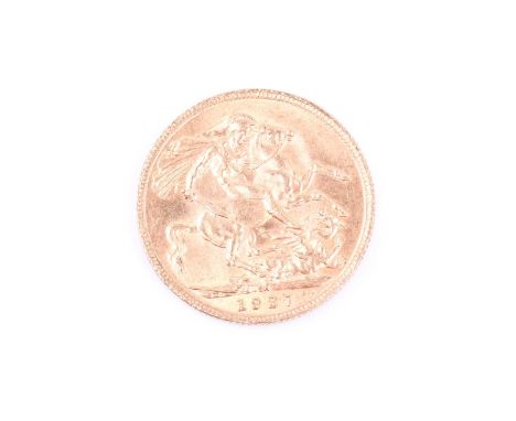 A George V full sovereign, 1927, bare head l. R. St. George and dragon, SA on ground for Pretoria Mint, South Africa, edge mi