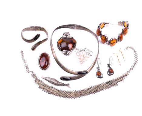 A Mexican silver collar necklace with black stones inset to terminals, together with a matching bracelet (one hardstone lacki