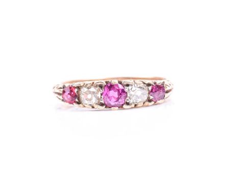 An 18ct yellow gold, diamond, and ruby ring, set with three round-cut rubies, and two old-cut diamonds of approximately 0.45 