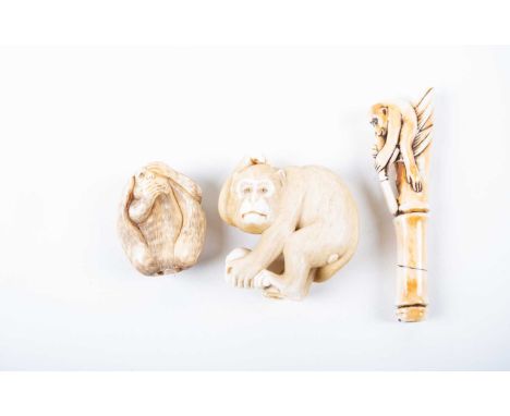 Three Japanese carved ivory netsuke, Meiji/Taisho period, comprising a large ape, bending over whilst scratching their head a