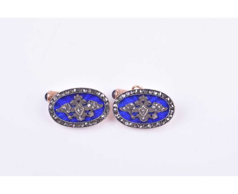 A pair of Russian gold, enamel, diamond and sapphire cufflinks, with 56 zoltnik mark, the oval panels with applied rose diamo