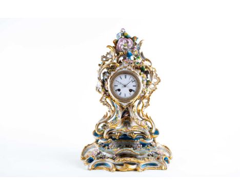 A 19th-century French porcelain chiming mantle clock on conforming stand, in the Sevres style with gilt and hand-painted deco