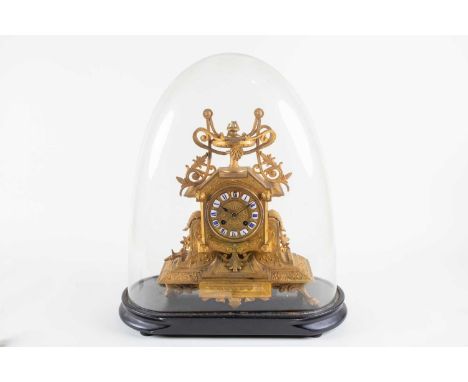 A Victorian gilt spelter mantel clock, the eight day movement by W Davis &amp; Sons, Paris, chiming on a bell, the dial with 