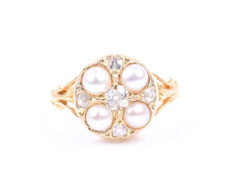 An 18ct yellow gold, diamond, and pearl cluster ring, of circular design, set with four pearls and five old-cut diamonds, siz