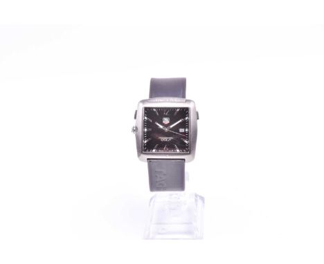 A Tag Heuer Golf wristwatch, Tiger Woods Edition, quartz movement, the square engine turned dial with baton indices and date 