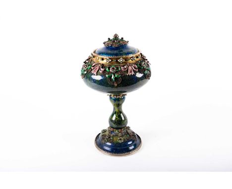 An Austrian silver gilt and enamel standing cup and cover, Vienna circa 1890, maker's mark N&amp;M in a shaped outline punch;