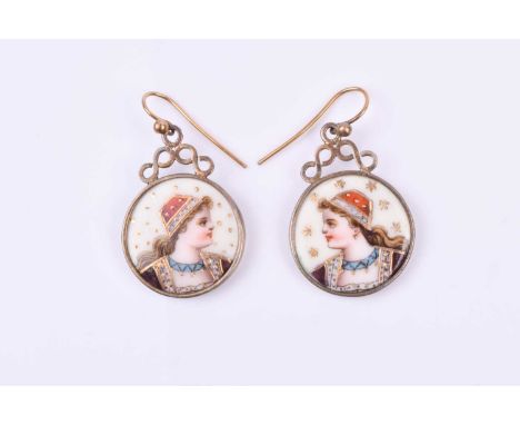 A pair of gilt metal and enamel Orientalist style earrings, the circular plaques each polychrome decorated with a beautiful y