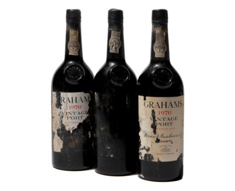 12 bottles Graham 1970 Douro Embossed capsules. Very damaged labels, two bottles without labels. Vintage and shipper not visi