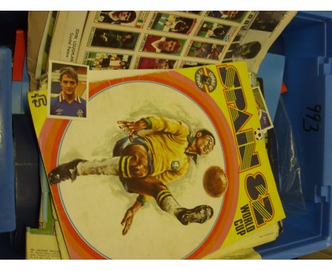 A collection of football memorabilia, a collection of sticker albums, fully and part completed in various condition, to inclu