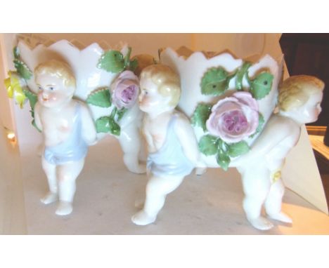 Two continental ceramic cherub posy holders, A/F