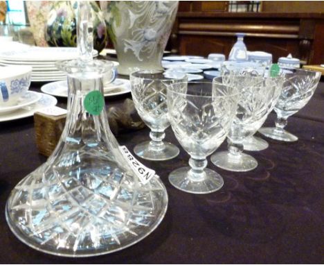 Small decanter and six wine glasses, chip to the rim of one glass
