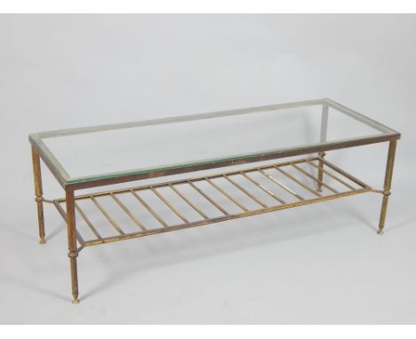 Manner of Mason Jenson, 20th C brass coffee table, rectangular glass top over fluted legs with 'ladder' under tier, 122.5cm L