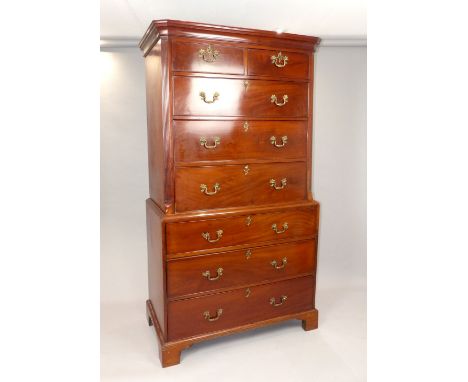 George III mahogany chest on chest, two short over six long drawers, chamfered reed corners, later handles, raised on bracket