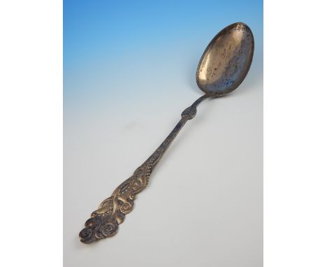 A. Rusmussen, Christian F. Heise, early 20th C oversized Danish silver serving spoon, elliptical well, handle cast with styli