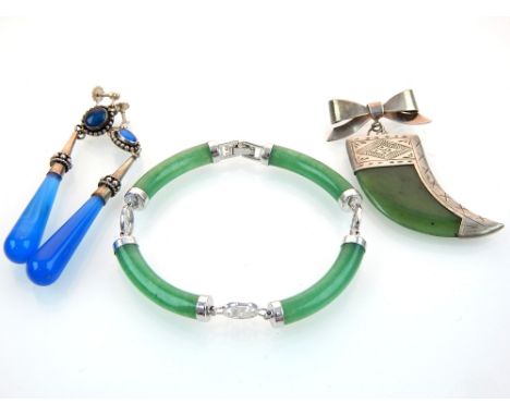 A Sterling silver mounted jade 'tigers chain' brooch, a Chinese jade bracelet and a pair of Continental silver mounted drop p