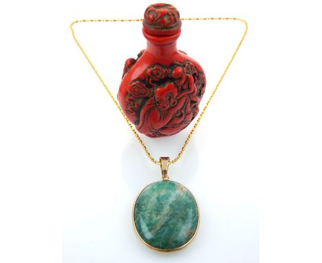 Chinese red snuff bottle, carvings of Buddha and children to one side and Buddha with a monkey to the other, 7.6cm h, and a j
