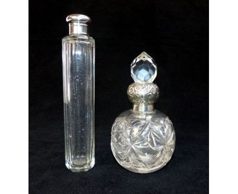 Silver mounted and cut glass scent bottle, Birmingham 1909, the body of globe form, with another silver mounted long faceted 