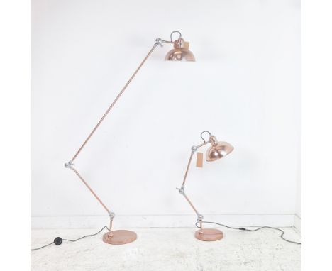 FLOOR STANDING READING LAMP, articulating design, coppered finish, 180cm H together with a matching desk lamp, 110cm H. (2)