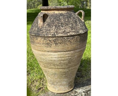 GARDEN PLANTER, well weathered terracotta with loop handles and incised detail, 73cm H.