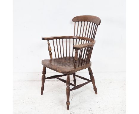 WINDSOR ARMCHAIR, 19th century beechwood and elm with comb back, 96cm H x 65cm.