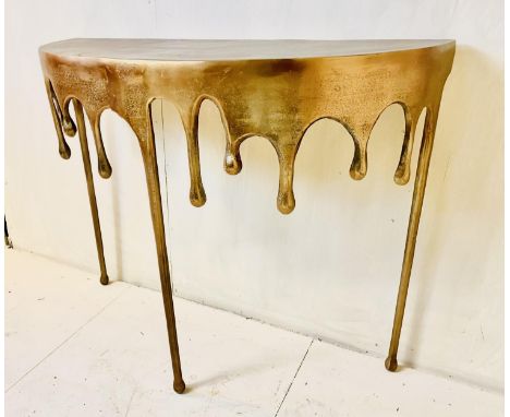 CONSOLE TABLE, surrealist style dripping design, gilt metal, 63cm H x 37cm W x 37cm D.