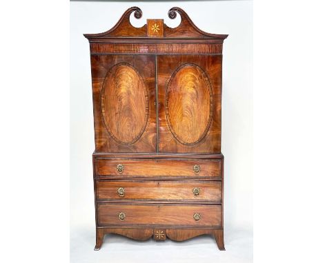 CHANNEL ISLAND LINEN PRESS, late 18th century flame mahogany and satinwood ebony lined, crossbanded with arch cornice, two ov