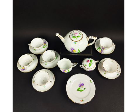 HEREND TEA SERVICE, six place setting, comprising a teapot, milk jug, sugar bowl and six cups and saucers. (Qty)
