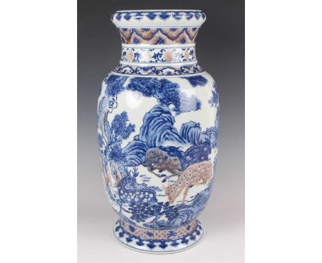 A Chinese underglaze blue and copper red porcelain vase, mark of Qianlong but probably 20th century or later, the swollen cyl